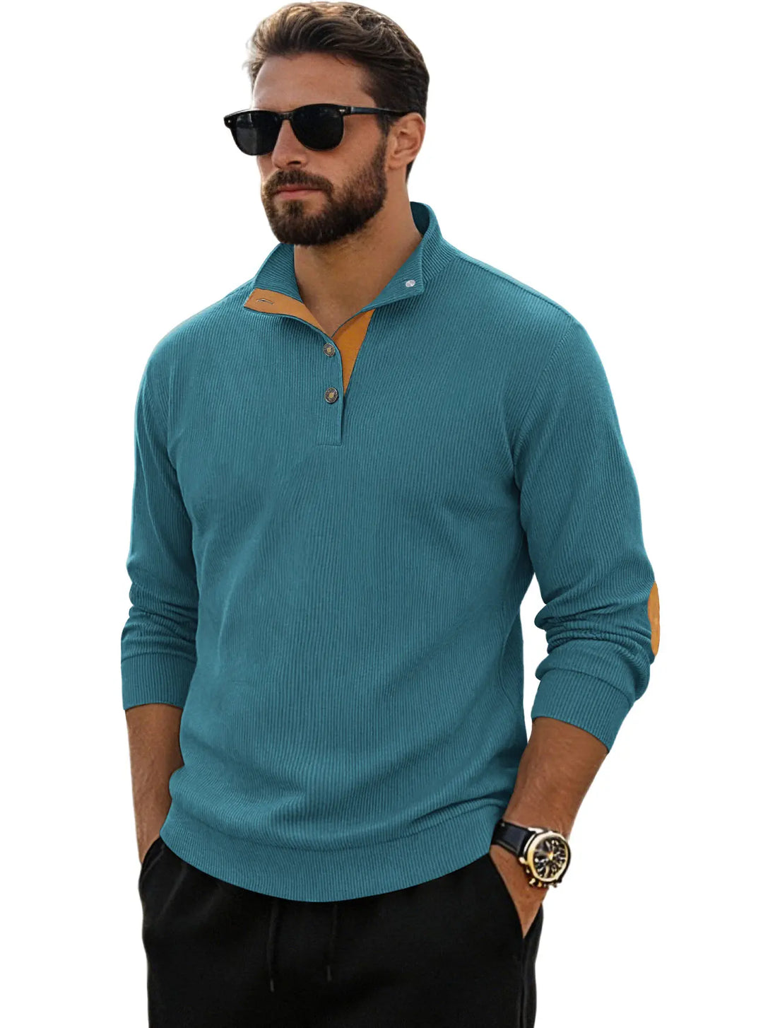 Teal fine-ribbed corduroy Henley pullover featuring a stand collar, antique brass buttons, and tan suede elbow patches, worn by a man.