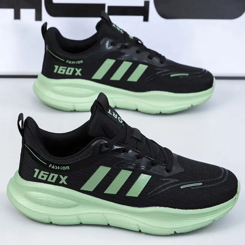 Black unisex low-top athletic sneakers with mint green soles and matching mint green three-stripe detail, featuring '160X' branding and breathable mesh uppers.