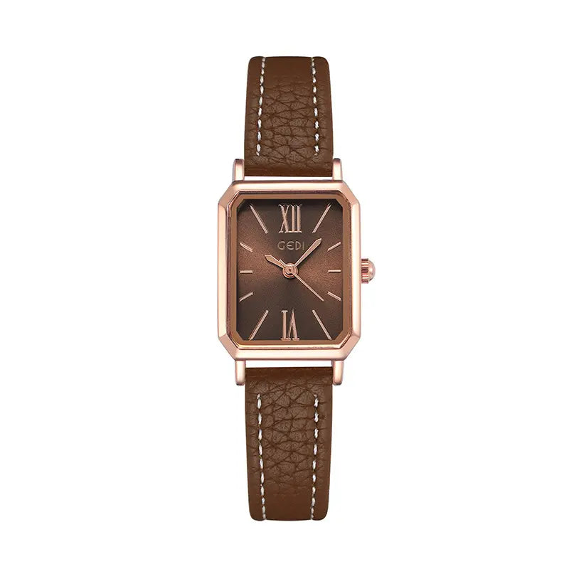 Elegant rose gold rectangular watch with a brown dial, Roman numeral markers, and a brown faux leather strap featuring white contrast stitching.