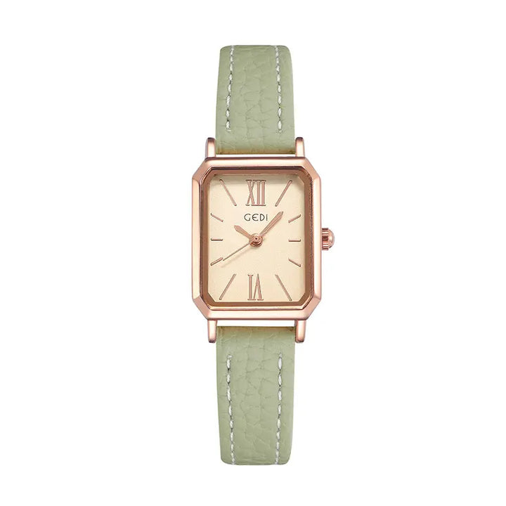 Elegant rectangular watch with a rose gold-tone case, pale green dial, Roman numerals, and dauphine hands, paired with a pale green faux leather strap featuring white contrast stitching.