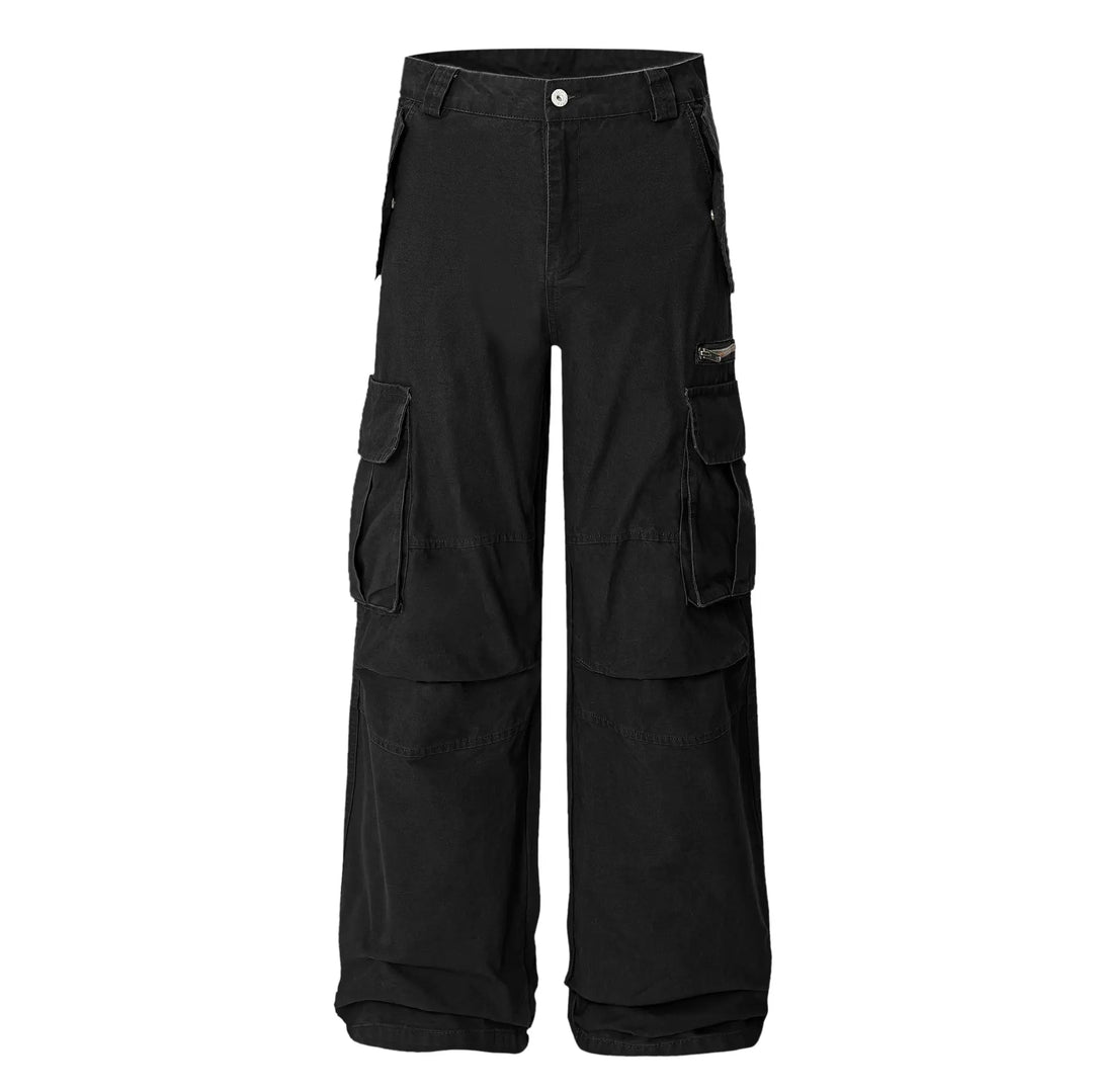 Vextar black relaxed fit wide-leg cargo pants from the front, featuring mid-rise waist, button fly, and multiple functional pockets including a zippered thigh cargo pocket. Matte cotton twill.