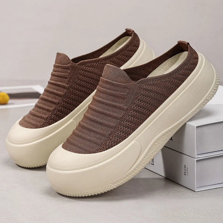 A pair of brown Vimera casual platform mules with a finely ribbed knit upper and a chunky, light creamy beige sole, shown from a three-quarter angle.