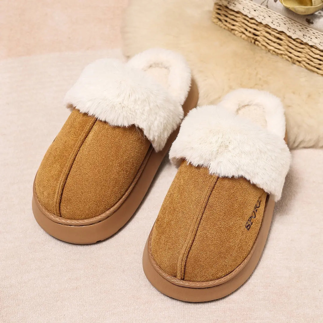 Warm brown plush faux fur lined mule slippers with a suede-effect upper and a discreet embroidered &