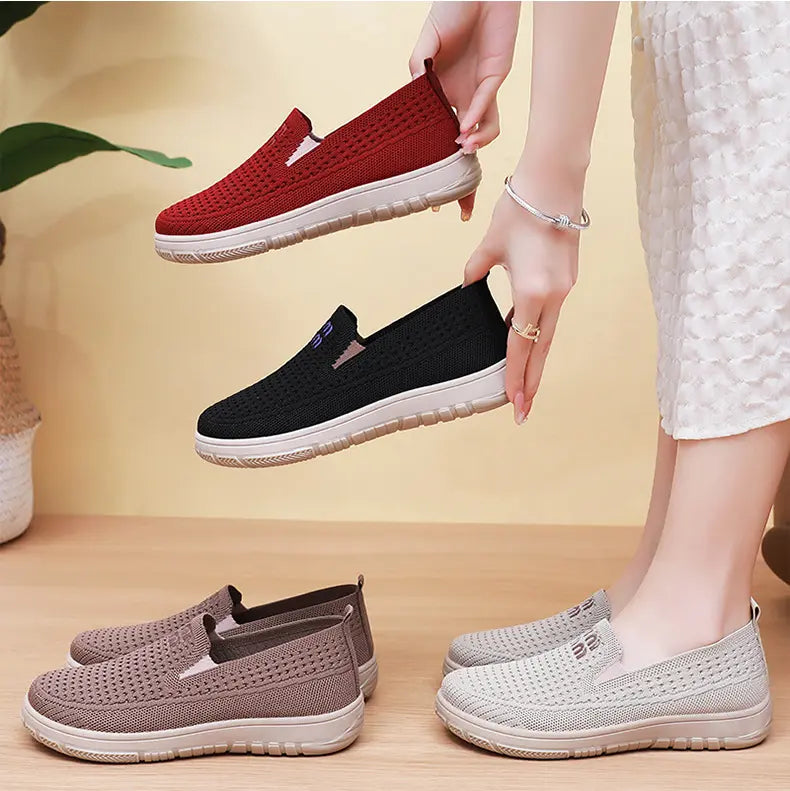 Three pairs of breathable knit slip-on trainers for women in black, red, and beige, with one pair shown on a model&