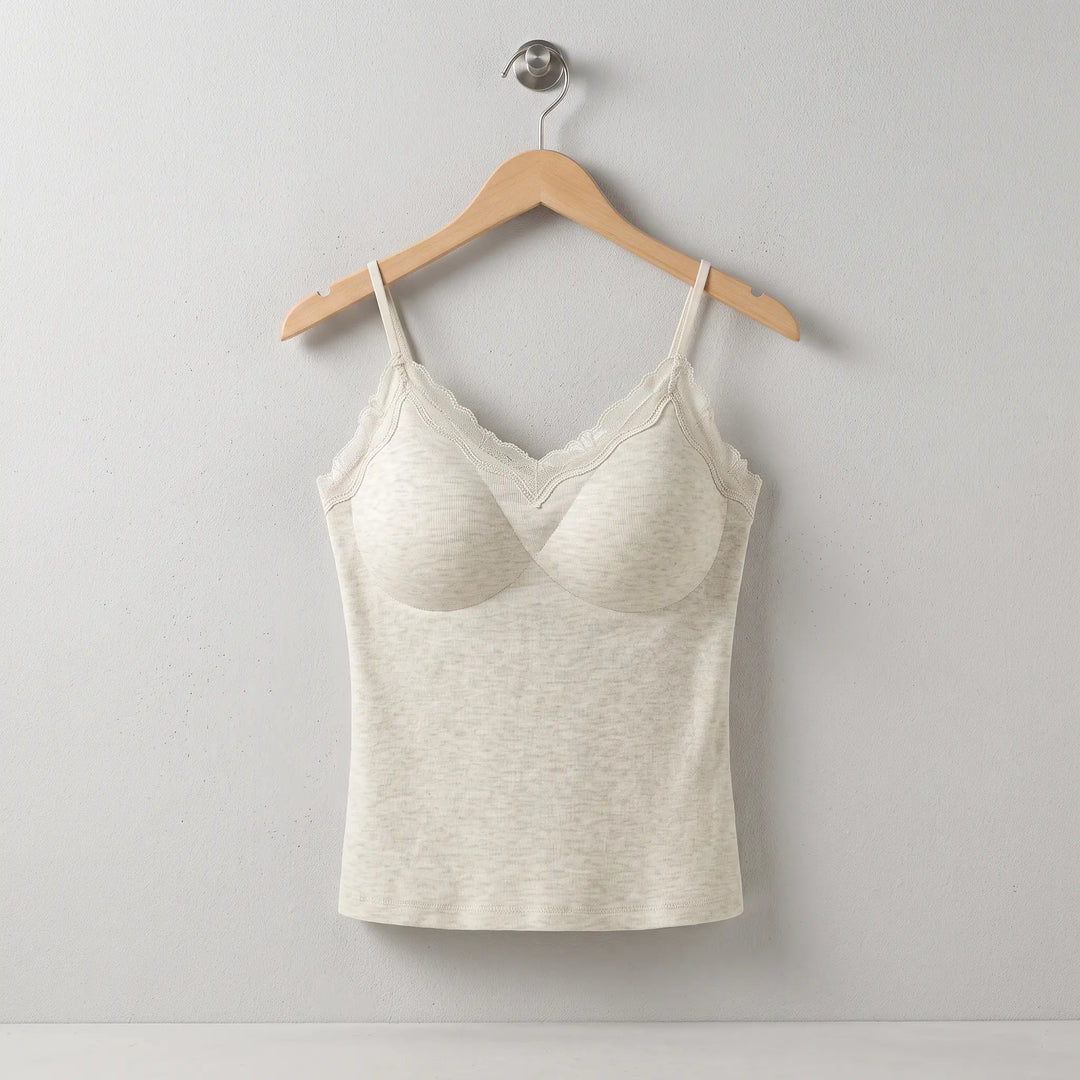 Front view of a fitted Xylos silk blend thermal camisole top in champagne nude, featuring a delicate lace-trimmed V-neckline and adjustable spaghetti straps.