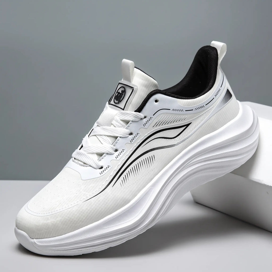 Zephyrin lightweight performance sneakers in pure white, showcasing a breathable engineered mesh upper and a sculpted white EVA sole from a three-quarter angle.