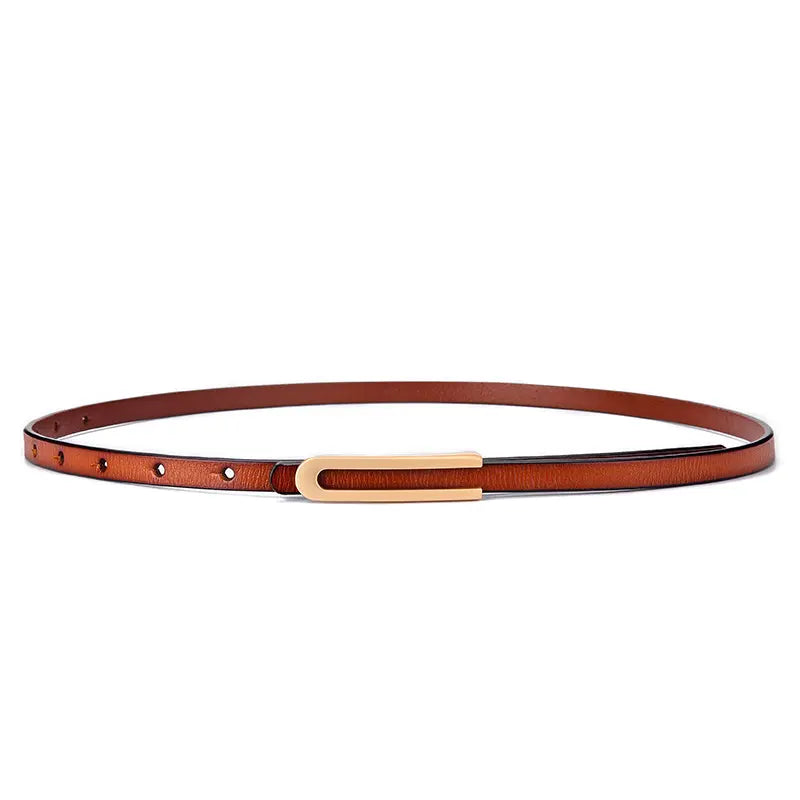 Zylia fine belt in rich reddish-brown genuine leather with a polished gold-tone elongated U-shaped buckle, laid flat.