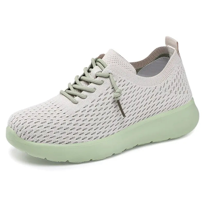 Dusty rose knit trainers comfort sneakers for women with a pastel green sole, featuring a breathable upper and lace-up closure, presented from a three-quarter view.