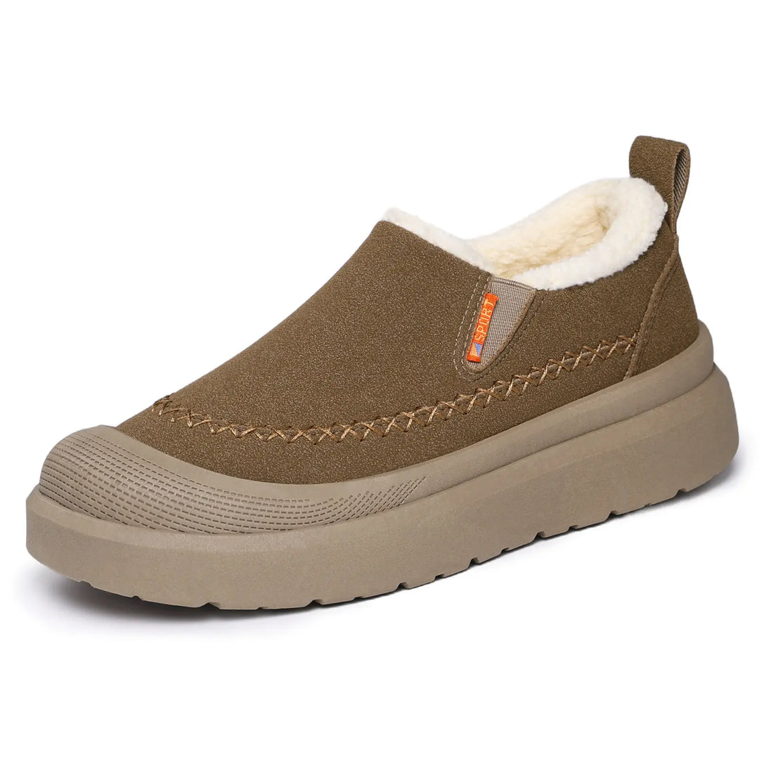 Camel brown slip-on comfort boots with a suede-like upper, plush shearling lining, decorative contrast stitching, and a chunky grey platform sole.
