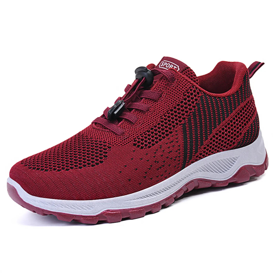 Zylos deep red lightweight walking trainers for men and women, featuring a breathable knit mesh upper with a quick-lace toggle system and a supportive rubber outsole.