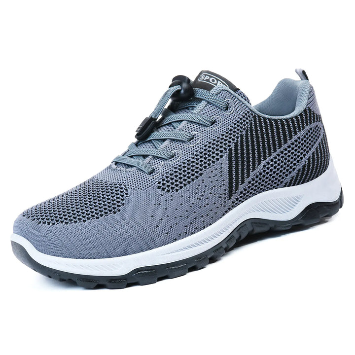 Grey lightweight walking trainers featuring a breathable knit mesh upper with a patterned design, a practical quick-lace toggle system, and a supportive white and black sole.