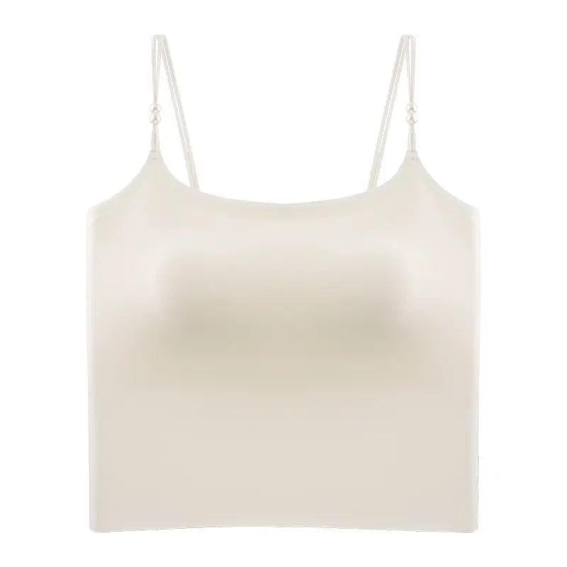 Zylovo seamless camisole in champagne white, featuring integrated 4cm molded cups, adjustable pearl-accented spaghetti straps, and a wide elasticated hem for sculpted comfort.
