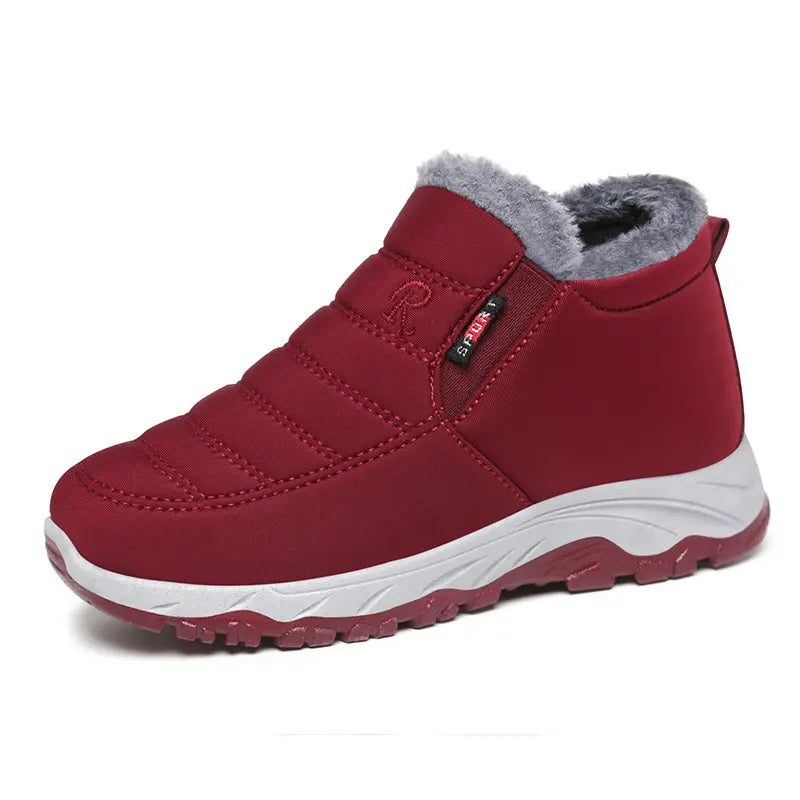 Zylpha warm winter ankle boots in burgundy red, featuring a quilted synthetic upper, plush faux-fur lining, and a durable rubber lug sole.