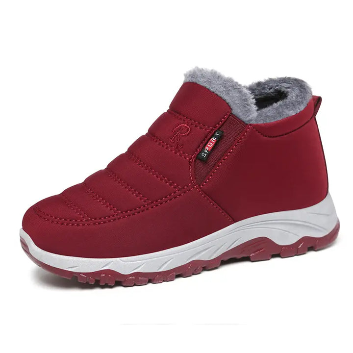 Zylpha warm winter ankle boots in burgundy red, featuring a quilted synthetic upper, plush faux-fur lining, and a durable rubber lug sole.