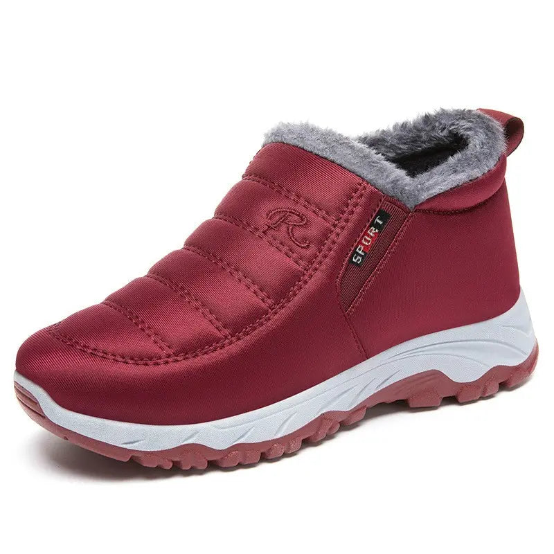 Zylpha burgundy quilted synthetic slip-on winter boots with plush faux-fur lining, white midsole, and red lug sole. Features &