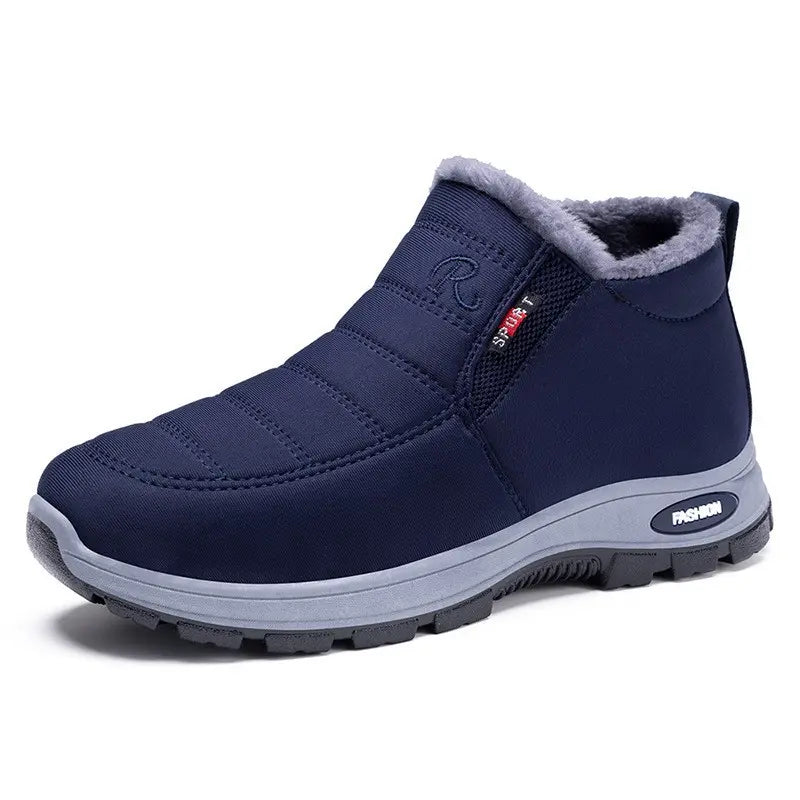 Zylpha warm navy blue quilted winter boots for women and men, featuring plush faux-fur lining, slip-on design, and durable lug sole.