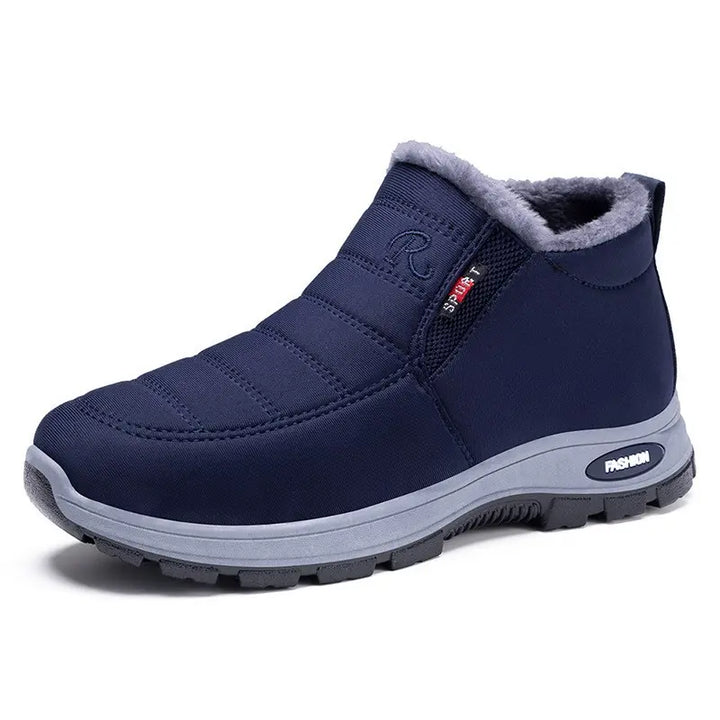 Zylpha warm navy blue quilted winter boots for women and men, featuring plush faux-fur lining, slip-on design, and durable lug sole.