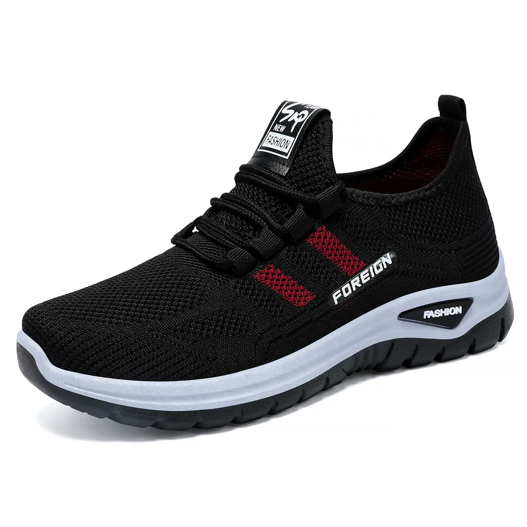 Zylva women's black breathable mesh sneakers with red stripe accents and 'FOREIGN' branding, shown in a three-quarter front view on a white background.