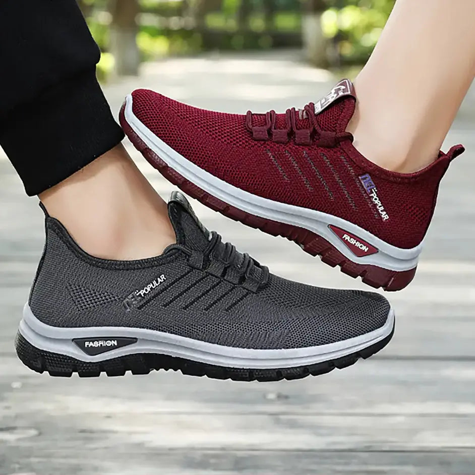 Two pairs of Zyphir lightweight breathable sneakers, one in grey and one in burgundy, shown on feet in a lifestyle setting with text overlay. Features slip-on design and cushioned soles for all-day comfort.