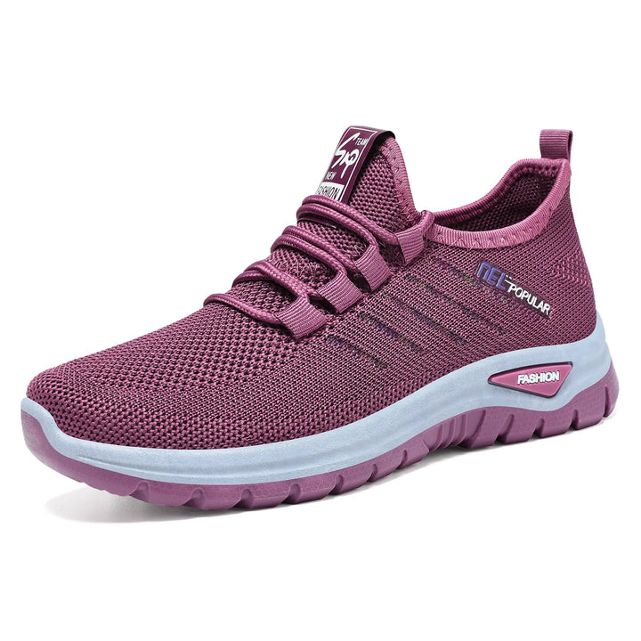 Lightweight purple engineered knit slip-on sneakers with a white midsole stripe and &