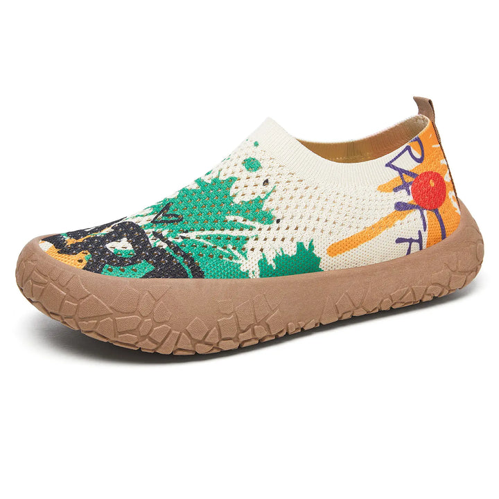 Zyra Artistic Print Slip-On Flats with a vibrant bohemian print on a breathable knit upper and a taupe rubber sole, shown in a three-quarter view.