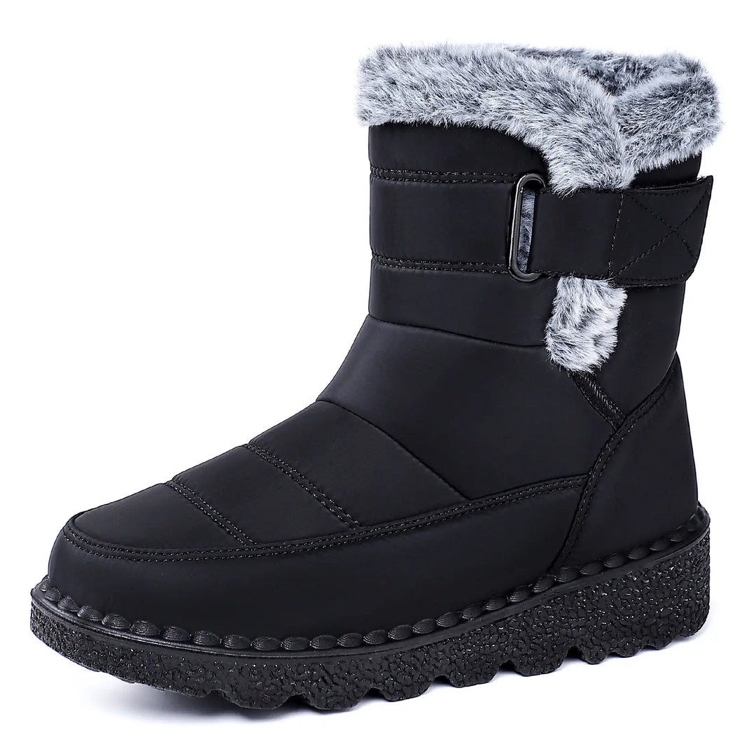 Black mid-calf Zyrion winter boot with faux fur lining, side zipper, adjustable buckle strap, and thick lugged platform wedge sole.